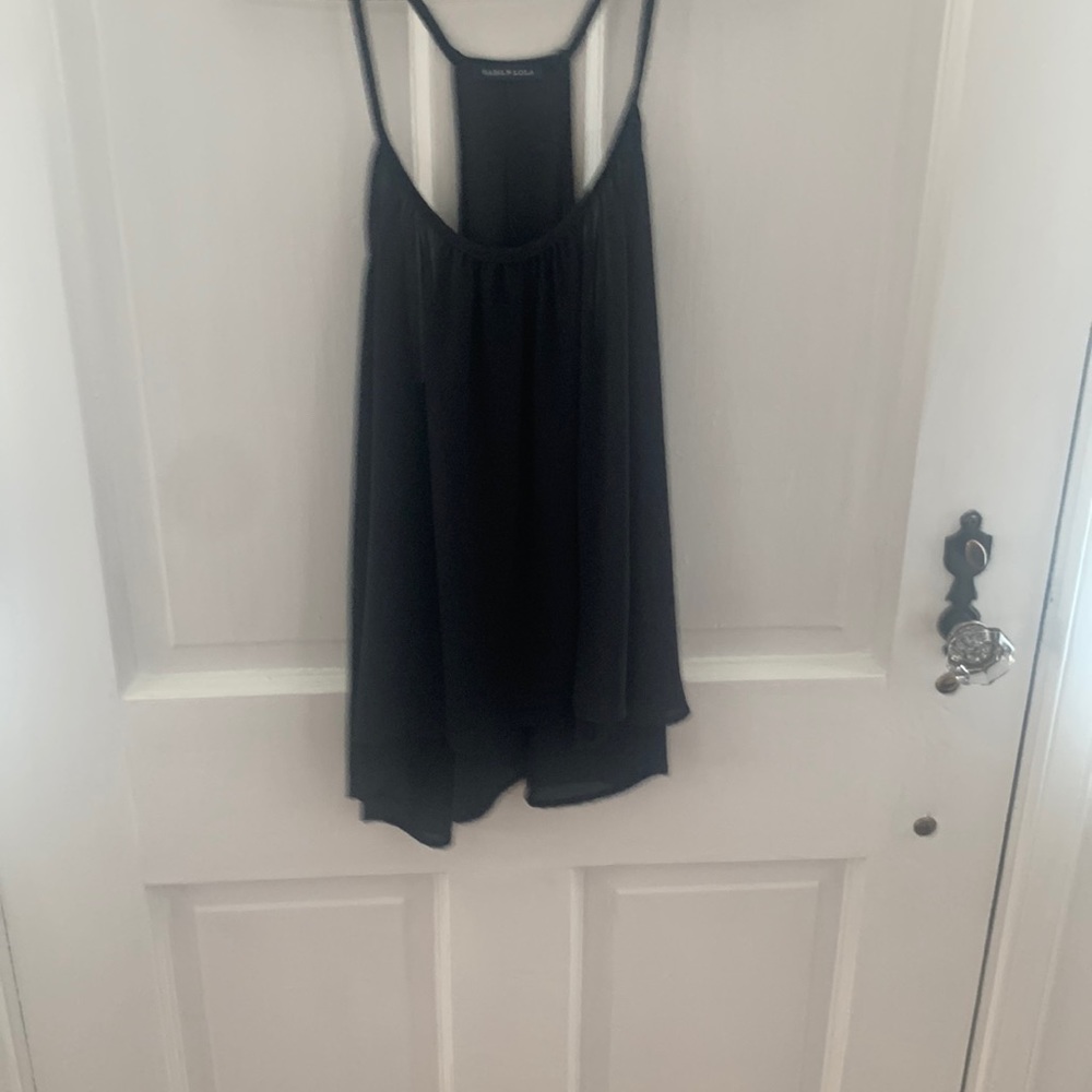 Black flowy top T-back with slit . Spaghetti straps Sz M